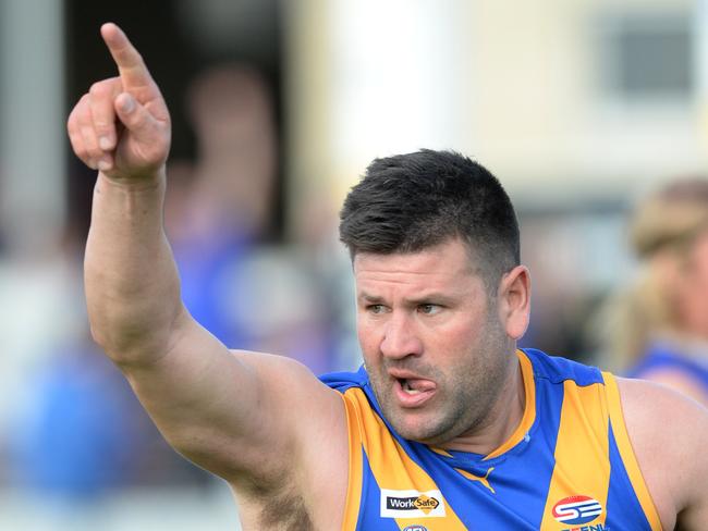 Cranbourne full-forward Marc Holt needing one goal to reach 1000 career goals took one minute of the first quarter to reach the milestone. Holt celebrates another goal.  Picture: AAP/ Chris Eastman