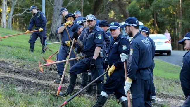 Police search the area opposite the house in Bennaroon Drive, Kendall where William Tyrrell went missing. Picture: Nathan Edwards