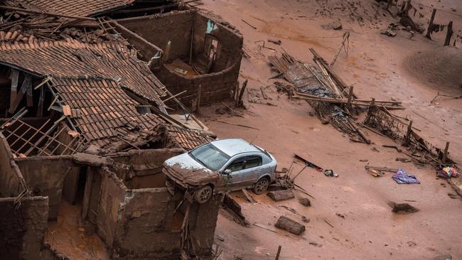 An aerial view in 2015 of the destruction to a village caused by the Samarco dam burst. Picture: AFP