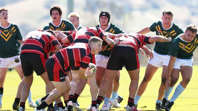 St Edward's College hooker Tyler Moriaty looks for a runner in the opening match of the NRL Schoolboy Cup.. Picture by Peter Lorimer.