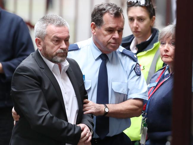 Borce Ristevski arrives from a prison van to the Supreme court in Melbourne. Monday, August 6. 2018. Picture: David Crosling