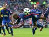 Manchester United's English midfielder Ashley Young falls to the ground after a challenge by Sunderland's English defender Wes Brown during the English Premier League football match between Sunderland and Manchester United at The Stadium of Light in Sunderland, north-east England on August 24, 2014. AFP PHOTO / IAN MACNICOL RESTRICTED TO EDITORIAL USE. No use with unauthorized audio, video, data, fixture lists, club/league logos or “live” services. Online in-match use limited to 45 images, no video emulation. No use in betting, games or single club/league/player publications.