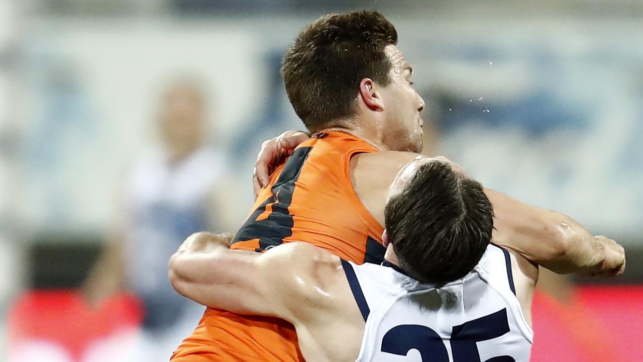 Toby Greene of the Giants made contact with Patrick Dangerfield of the Catsa. Picture: Darrian Traynor