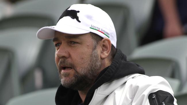 Russell Crowe wearing a hat similar to the auctioned cap at Rabbitohs’ training. Picture: Bohdan Warchomij