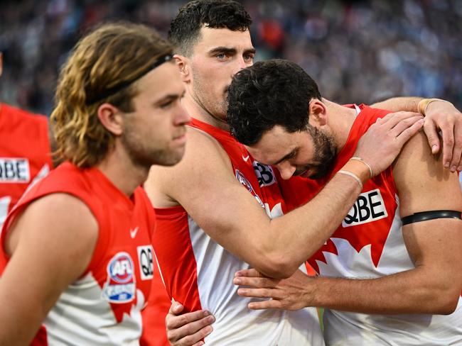 Paddy and Tom McCartin feel the emotion of the grand final. Picture: Daniel Carson/AFL Photos via Getty Images