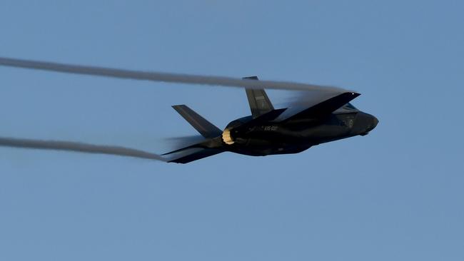 BEST PHOTOGRAPHS 2022. Evan Morgan. A RAAF F35A Lightning II does a solo airshow on the Strand. Picture: Evan Morgan