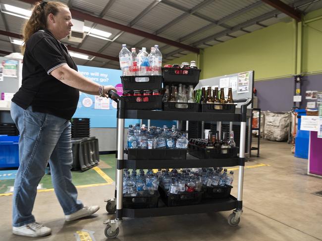 Lifeline Darling Downs business services manager Angela Klein processes a customers recyclables at Lifeline's Perth St Containers for Change depot, Monday, May 11, 2020. Picture: Kevin Farmer