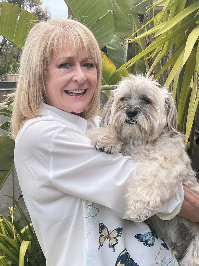 Companion Animal Network CEO Trish Ennis with dog Buddy.