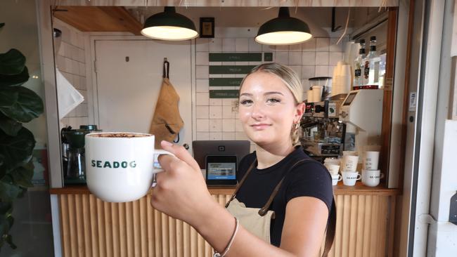 Elle Ogilvie with coffee at Seadog Burleigh . Picture Glenn Hampson