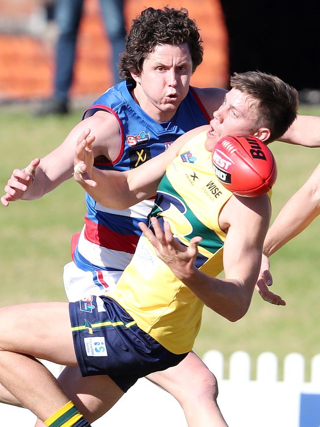 Eagles Jack Hayes marks the ball from Centrals Nicholas Madden Picture: Sarah Reed