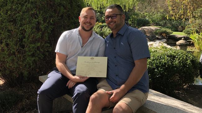 Berry, left, and his husband and co-accused Mathew Campbell, right, on their wedding day. Picture: Supplied