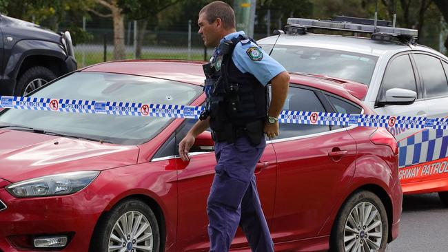 Two crime scenes were established after a Grafton man was taken to hospital after being shot in the right shoulder during a special police operation on the Pacific Highway near Coffs Harbour. Picture: Frank Redward.