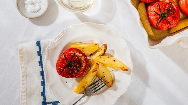 Zucchini flowers, stuffed rice tomatoes, fried zucchini flowers. Recipe by Lizzie Hewson. Picture: Nikki To