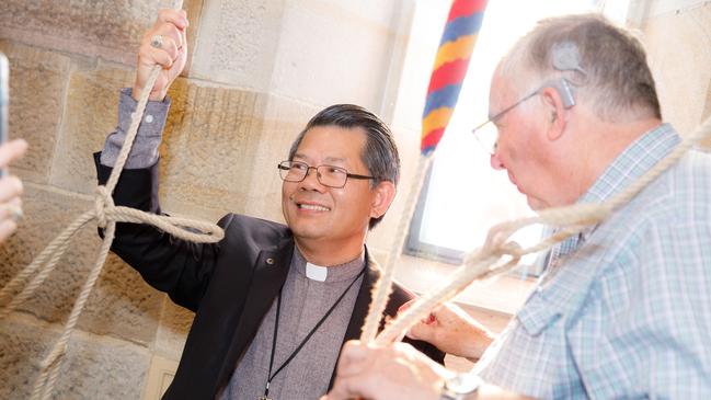 Parramatta Bishop Vincent Long (left) at St Patrick's Cathedral at Parramatta, shortly before they were installed on Christmas Eve.