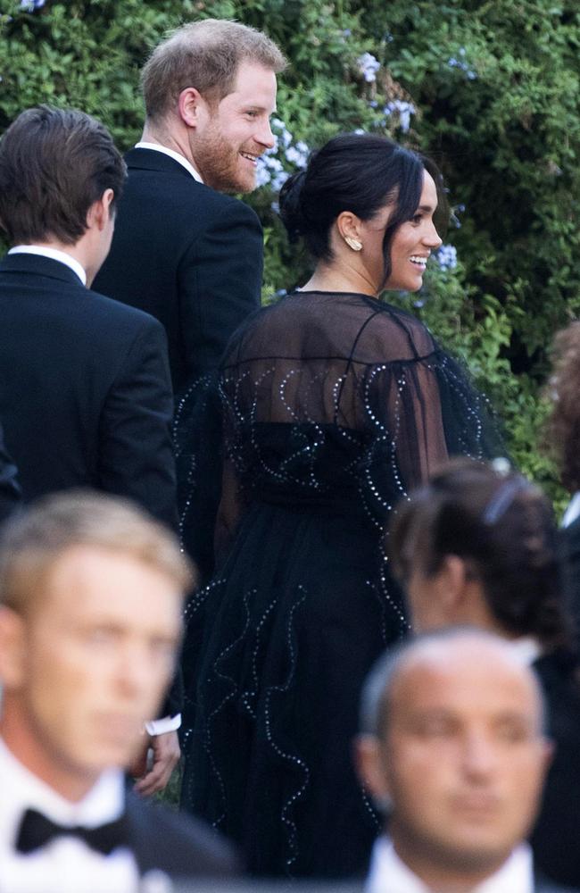 Prince Harry and his wife Meghan arrive at the wedding of Misha Nonoo and Michael Hess in Rome. Picture: Claudio Peri/ANSA