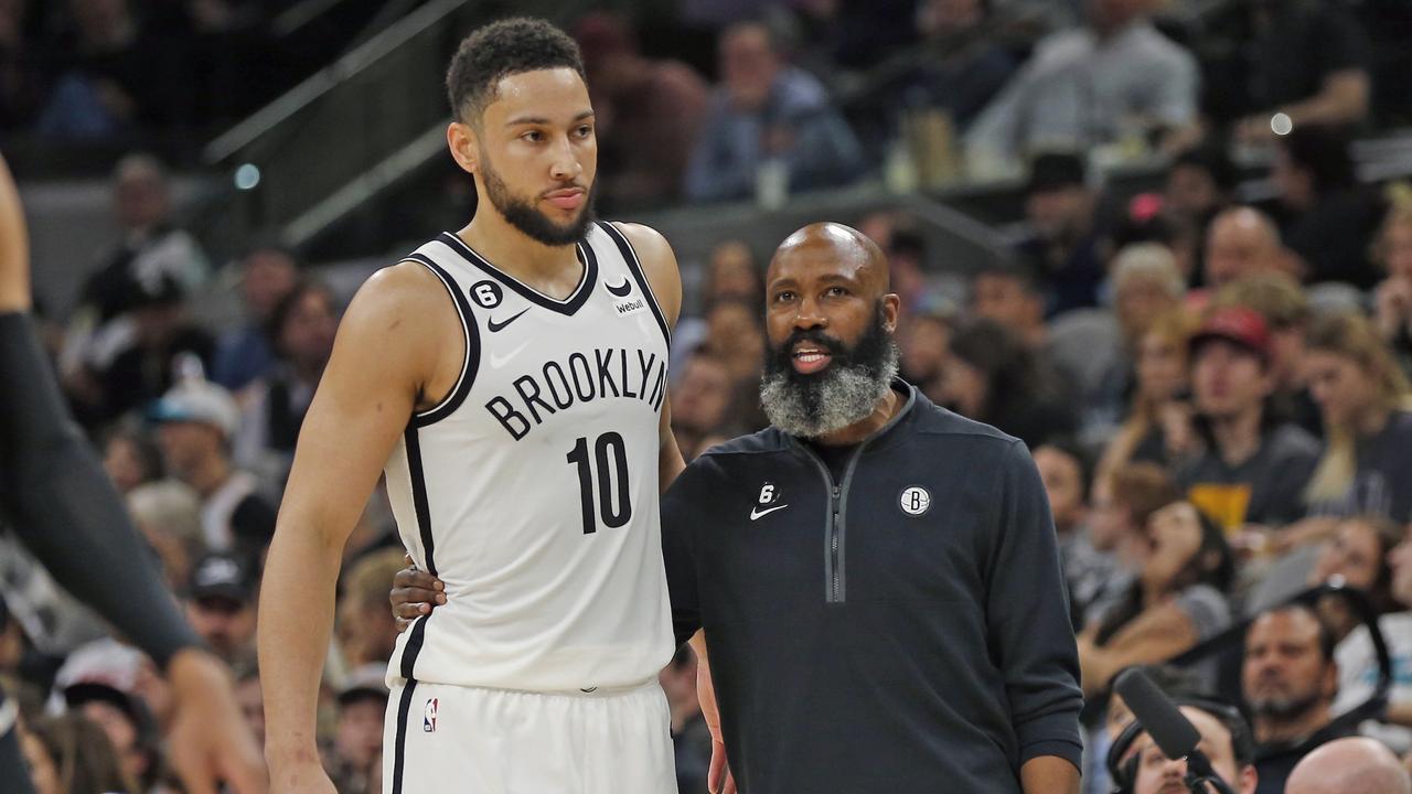 Jacque Vaughn talks with Simmons. (Photo by Ronald Cortes/Getty Images)