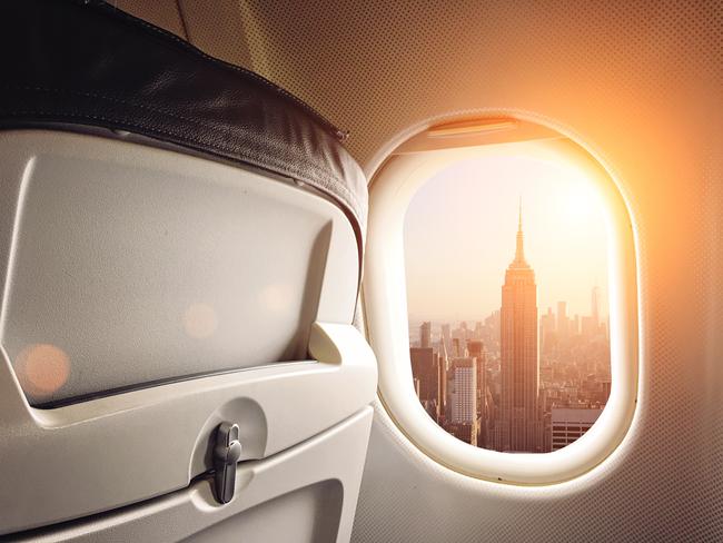 Airplane window New York City aerial view cityscape panoramic USA