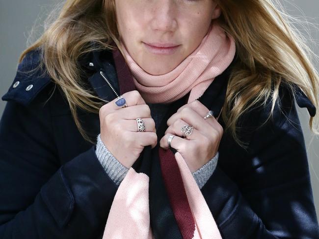 Jenny McCullagh, 24, Brisbane City, rugged up for a cold Brisbane morning, James St, Fortitude Valley. Photographer: Liam Kidston.