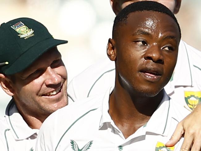MELBOURNE, AUSTRALIA - DECEMBER 26: Kagiso Rabada of South Africa celebrates dismissing Usman Khawaja of Australia during day one of the Second Test match in the series between Australia and South Africa at Melbourne Cricket Ground on December 26, 2022 in Melbourne, Australia. (Photo by Darrian Traynor/Getty Images)