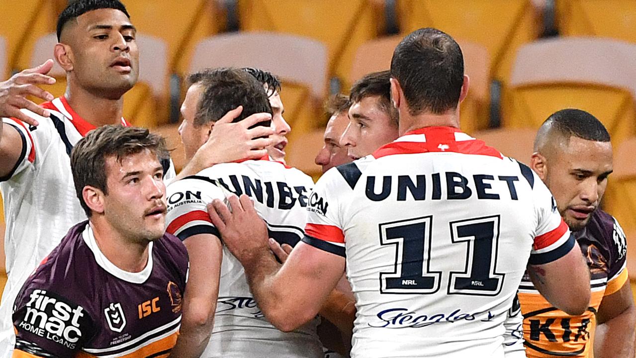 Josh Morris of the Roosters celebrates after scoring a try.