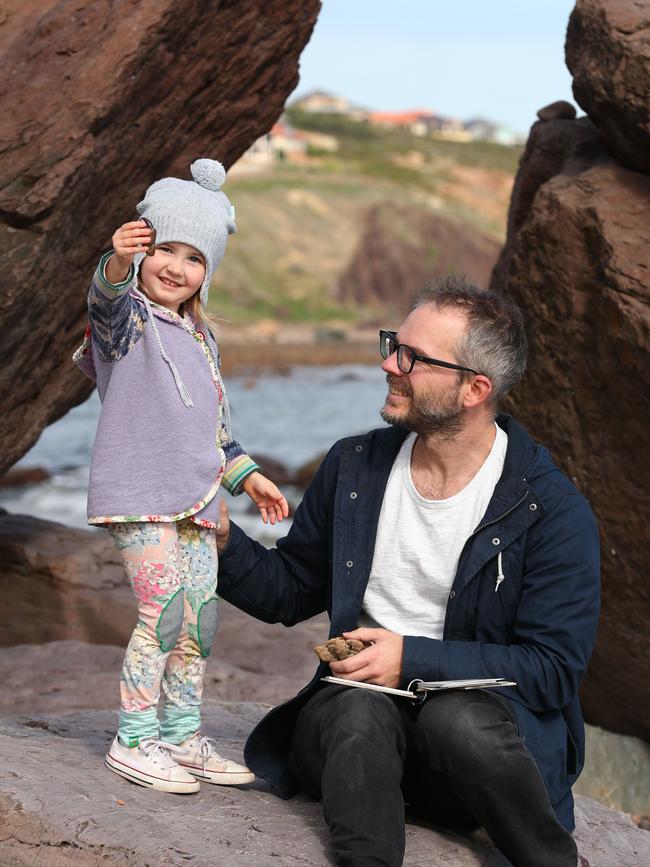 DISCOVERY: Jason Tyndall, and his daughter Eloise, 3, at Hallett Cove beach. Pictures: TAIT SCHMAAL