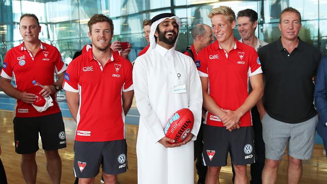 Swans coach John Longmire, Luke Parker, Isaac Heeney and Roosters coach Trent Robinson with Abdullah Al Boshi from the Aspetar Centre of Excellence. Picture: Phil Hillyard