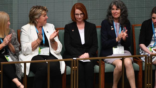 Former prime minister Julia Gillard, centre. Picture: AAP