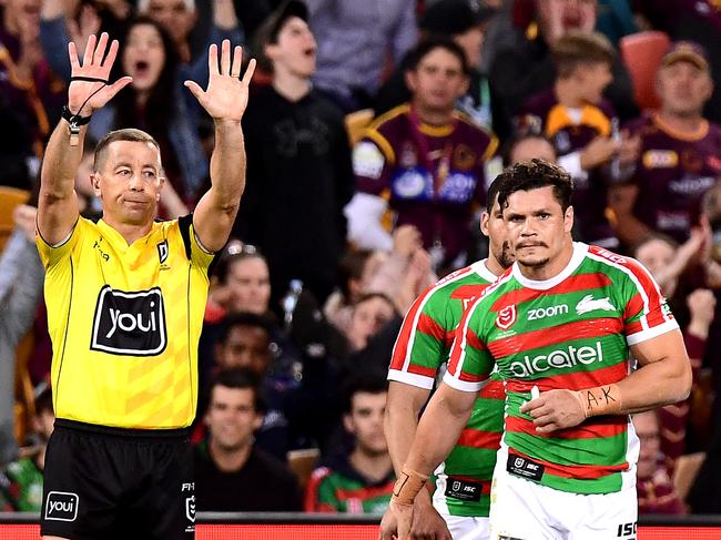 James Roberts of the Rabbitohs is sent to the sin bin for illegal contact with Corey Oates of the Broncos. Picture: Bradley Kanaris/Getty Images