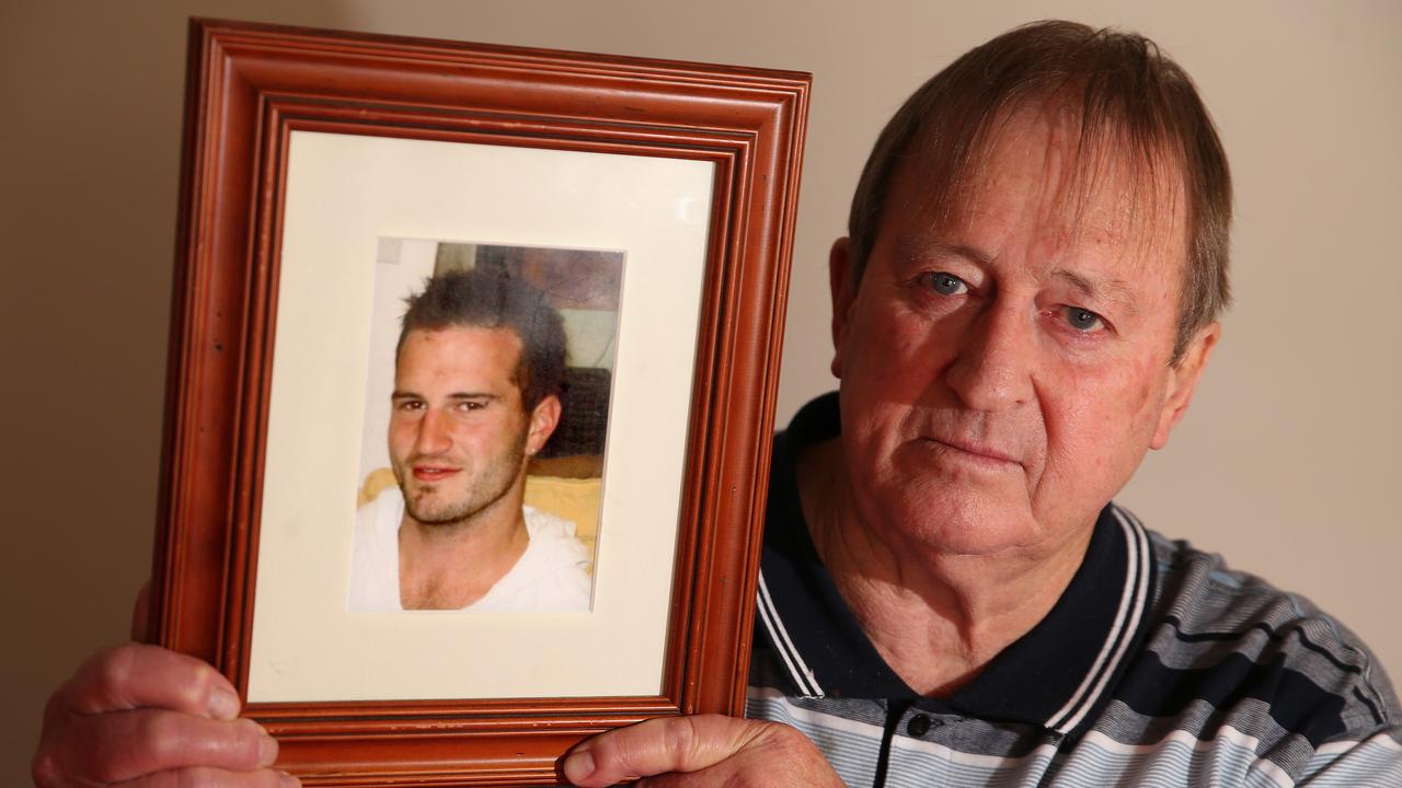 Gary Kingsbury with a photo of his son. Picture: Alison Wynd