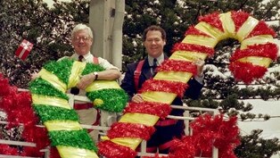 Mr Gamin with then-Mayor Ray Stevens hanging Christmas decorations in the mid-1990s.