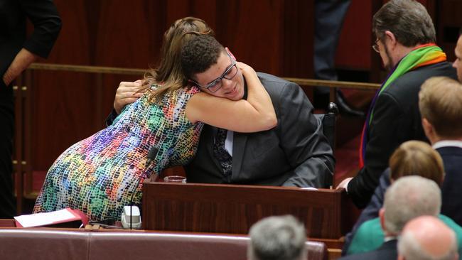 Sarah Hanson-Young hugs Jordon Steele-John after his maiden speech in the Senate chamber. Picture: Gary Ramage