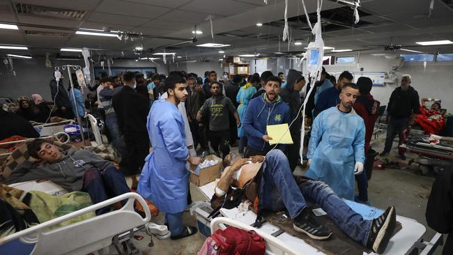 Injured people receive treatment in Gaza City's Al-Shifa hospital, following a reported Israeli strike. Picture: AFP