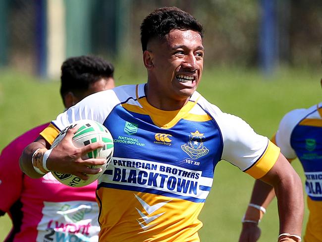 NRL Schoolboy Cup - Patrician Bros v St Gregs at South Windsor. Patrician Bros Kristian Li Mai makes a break in the Patrician Bro's 52-22 win. Picture: Toby Zerna