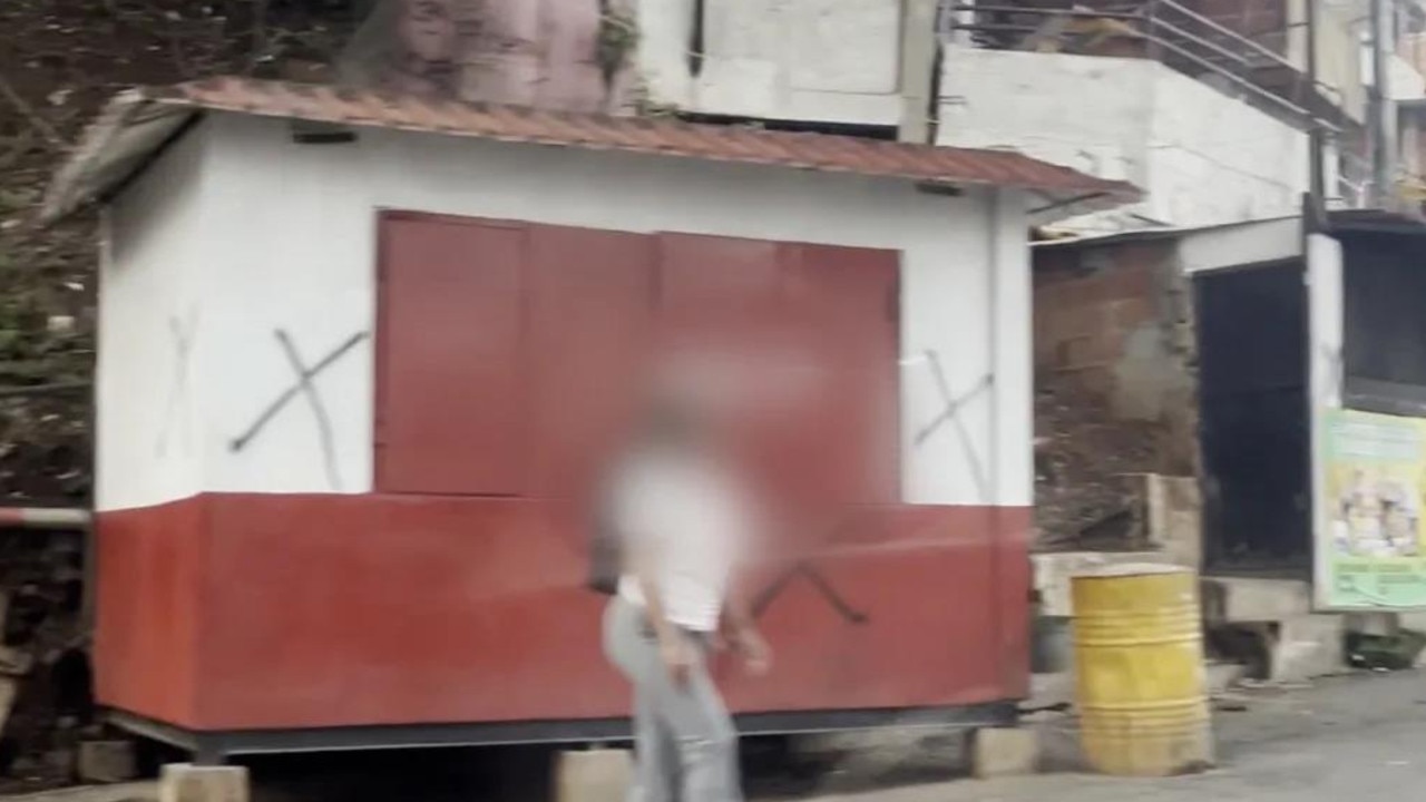 Residents say the black marks were spray painted by a paramilitary unit. Picture: CNN