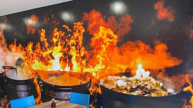 Potjie Pot ovens are painted on the restaurant’s walls.