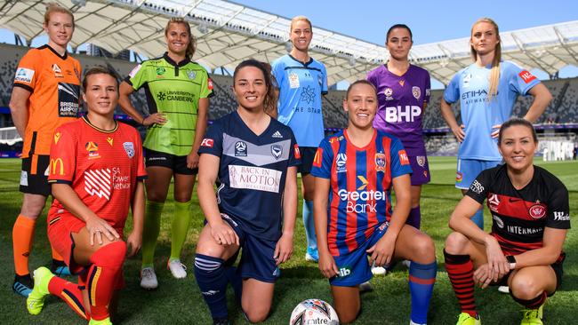 (Back row l-r) W-League players Clare Polkinghorne of Brisbane Roar, Katie Stengel of Canberra United, Alanna Kennedy of Sydney FC, Alexia Morena of Perth Glory and Ellie Carpenter of Melbourne City. (Front row l-r) Amber Brooks of Adelaide United, Jenna McCormick of Melbourne Victory, Gema Simon of Newcastle Jets and Erica Halloway of the Western Sydney Wanderers at Thursday’s season launch at Bankwest Stadium in Sydney. Picture: AAP