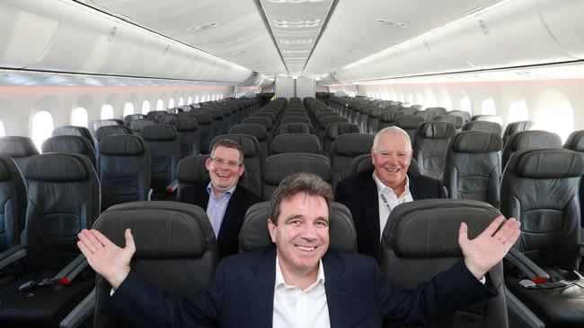 David Hall from Jetstar, David Collins from Gold Coast Airport and Paul Donovan from Qld Airports aboard Jetstar’s inaugural 787 dreamliner service to Tokyo-Narita in 2014. Picture: Glenn Hampson.