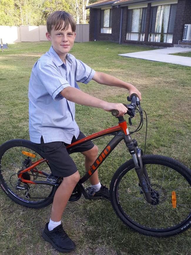 Josh riding on his new bike.