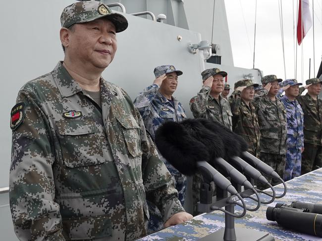 Chinese President Xi Jinping speaks after he reviewed the Chinese People's Liberation Army (PLA) Navy fleet in the South China Sea this month: Picture: AP