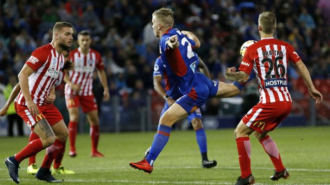 SA-born talent Riley McGree scores his scorpion kick wonder-goal for former club Newcastle jets. Picture: AAP Image/Darren Pateman