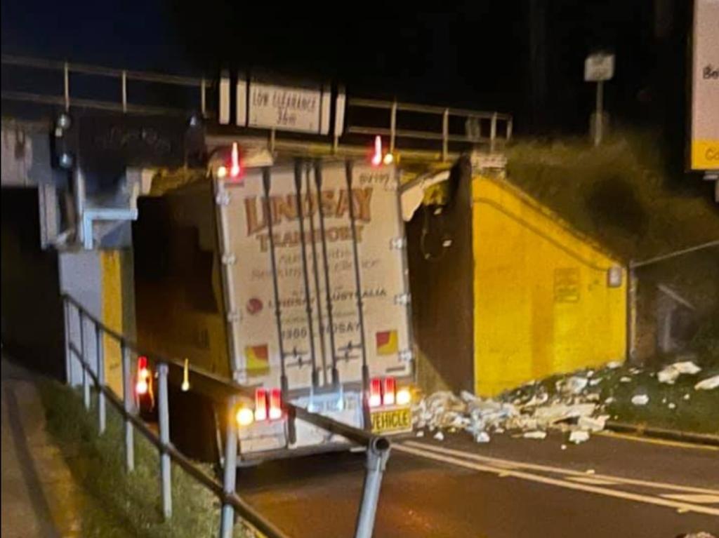 A truck was stuck under the Oxley Road railway bridge this morning in Corinda.