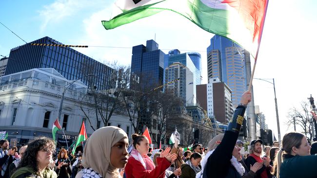 People gathered outside Parliament House in Melbourne in support of the Palestinian people. Picture: NewsWire / Andrew Henshaw