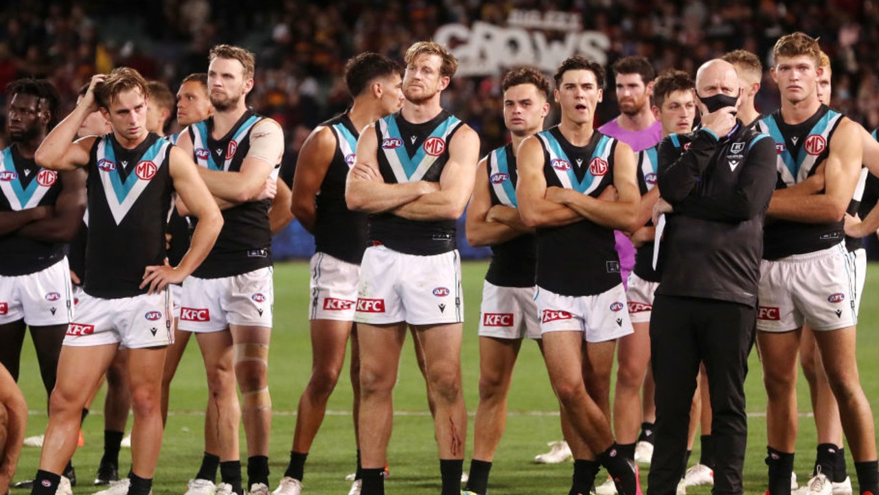 ADELAIDE, AUSTRALIA - APRIL 01: Port Adelaide Players stand after the loss during the 2022 AFL Round 03 match between the Adelaide Crows and the Port Adelaide Power at Adelaide Oval on April 01, 2022 In Adelaide, Australia. (Photo by Sarah Reed/AFL Photos via Getty Images)