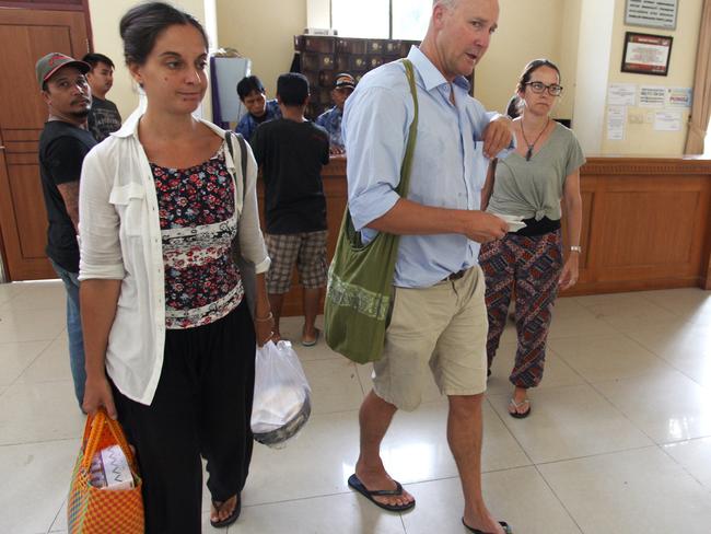 Sara Connor's friend Ambra Bertoldi brings a cake during a visit her to in jail with her lawyer Peter Strain to celebrate Sara's birthday. Picture: Lukman S Bintoro