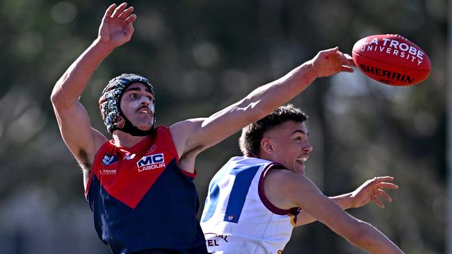 Diamond Creek’s Jett McLaughlan and James Traianou of South Morang battle for the ball. Picture: Andy Brownbill