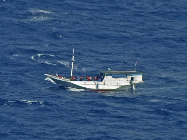 A boat carrying asylum seekers near Christmas Island. Picture: AP Photo/Indonesian National Search and Rescue Agency