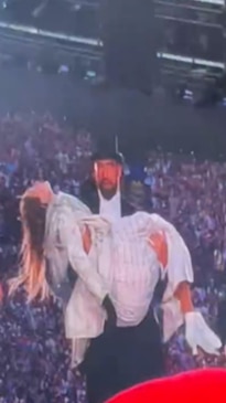 Fans go crazy as Travis Kelce joins Taylor Swift on stage