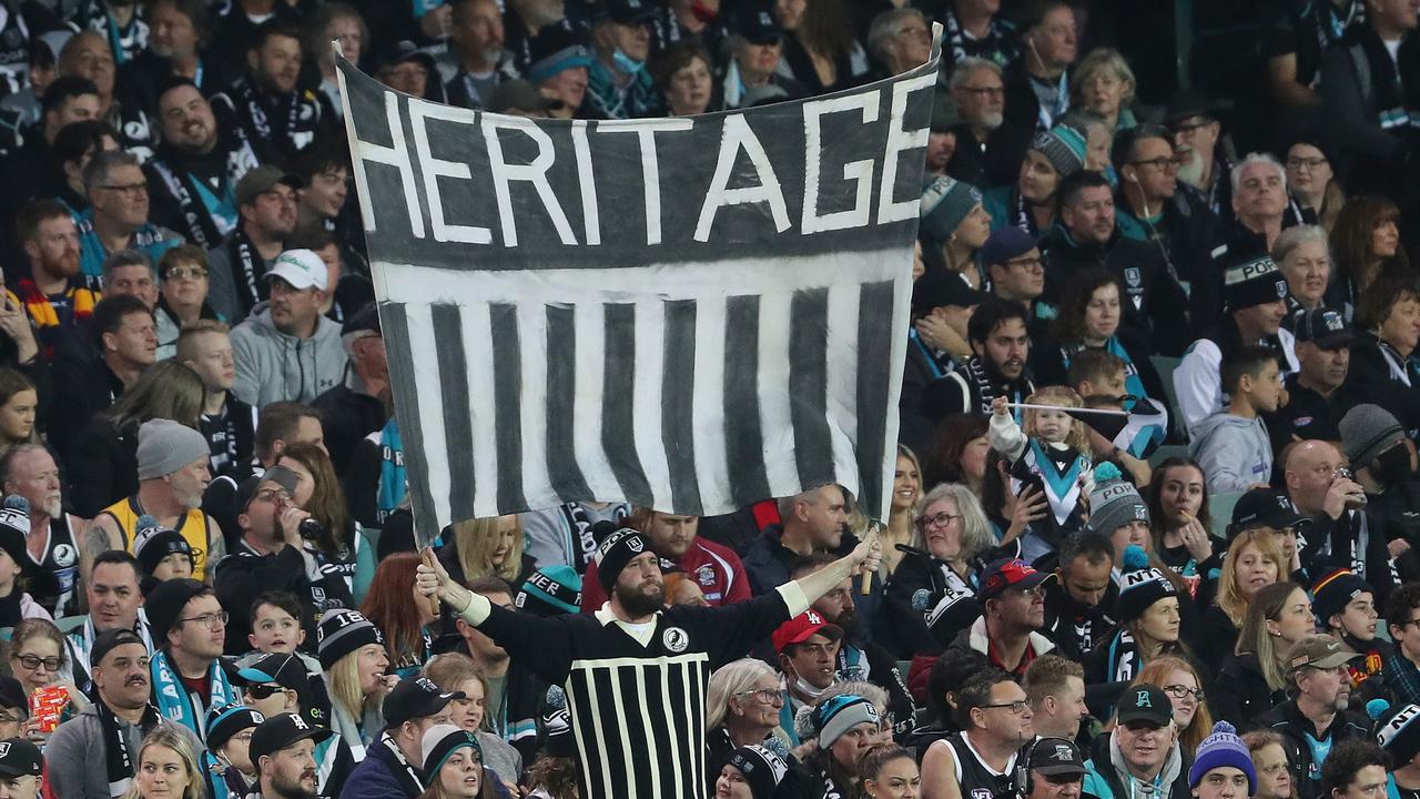 A Port fan holds up a prison bar sign during a Showdown clash last year.