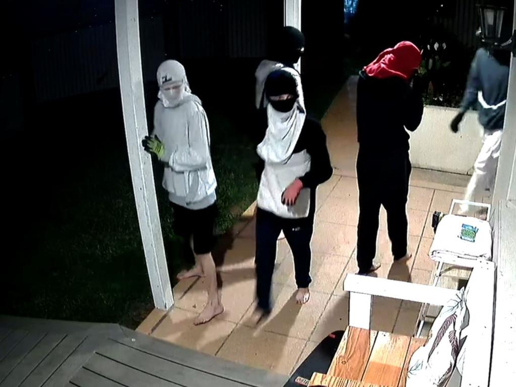 A group of men attempt to break into a Camp Hill home in Brisbane.