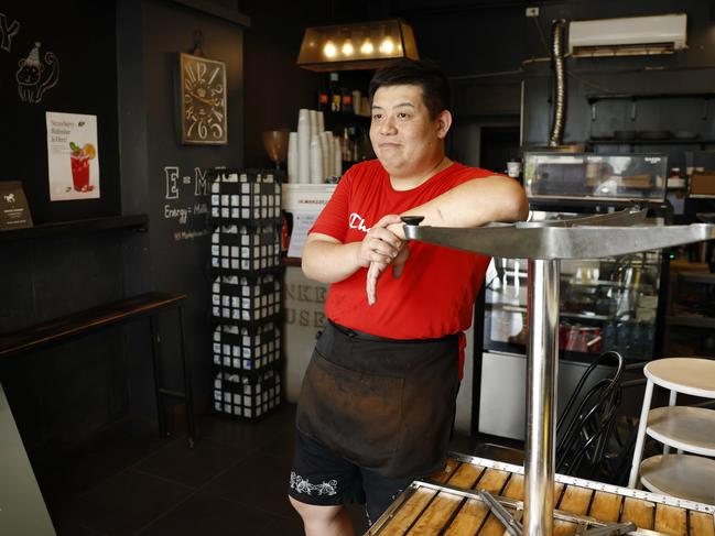 John Zhou, owner of Monkey House Cafe in Strathfield, said the strikes had decimated his business. Picture: Richard Dobson